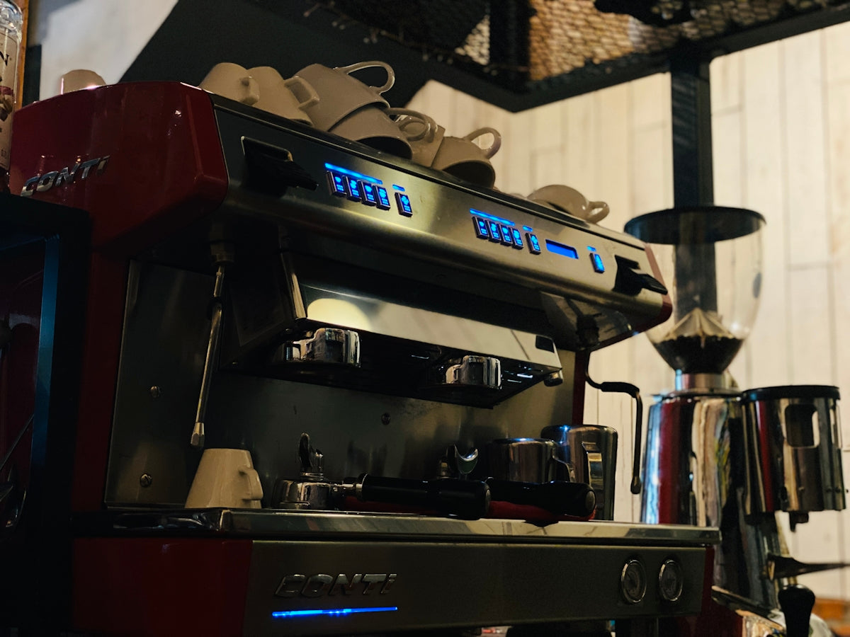 a coffee machine sitting on top of a counter